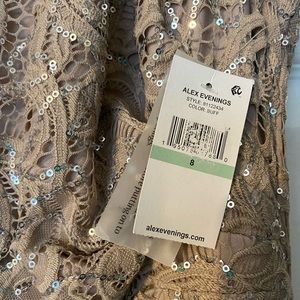 I love this dress!! Very flattering on and comfortable.